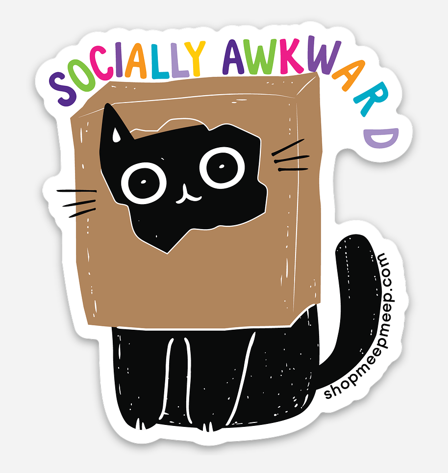 Vinyl Sticker with an illustrated black cat wearing a paper bag over it's head but it's eyes, ear and nose are peaking out.  The text 'Socially Awkward' is at top on white background