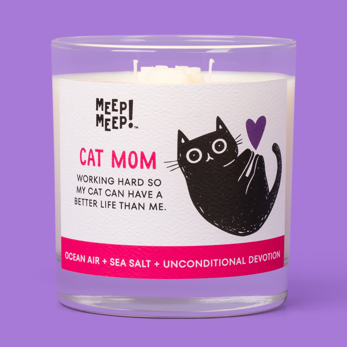 Meep Meep Cat Mom candle in a clear glass jar with a white and pink label featuring a curled black cat and purple heart.