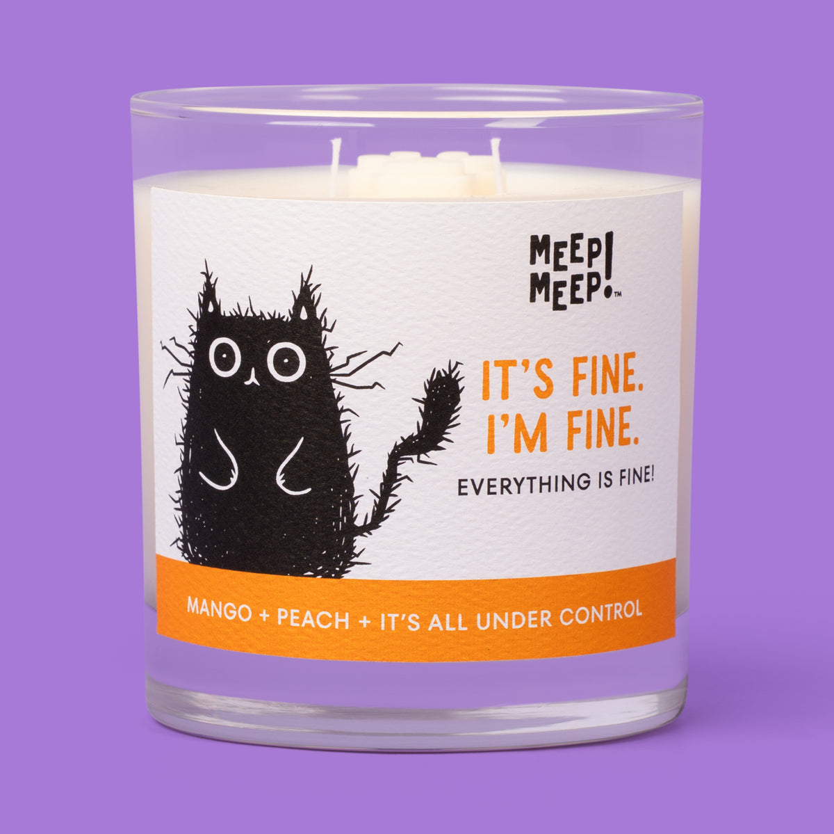 Meep Meep It’s Fine. I’m Fine. candle in a clear glass jar with an orange-accented label featuring a wide-eyed, frazzled black cat.