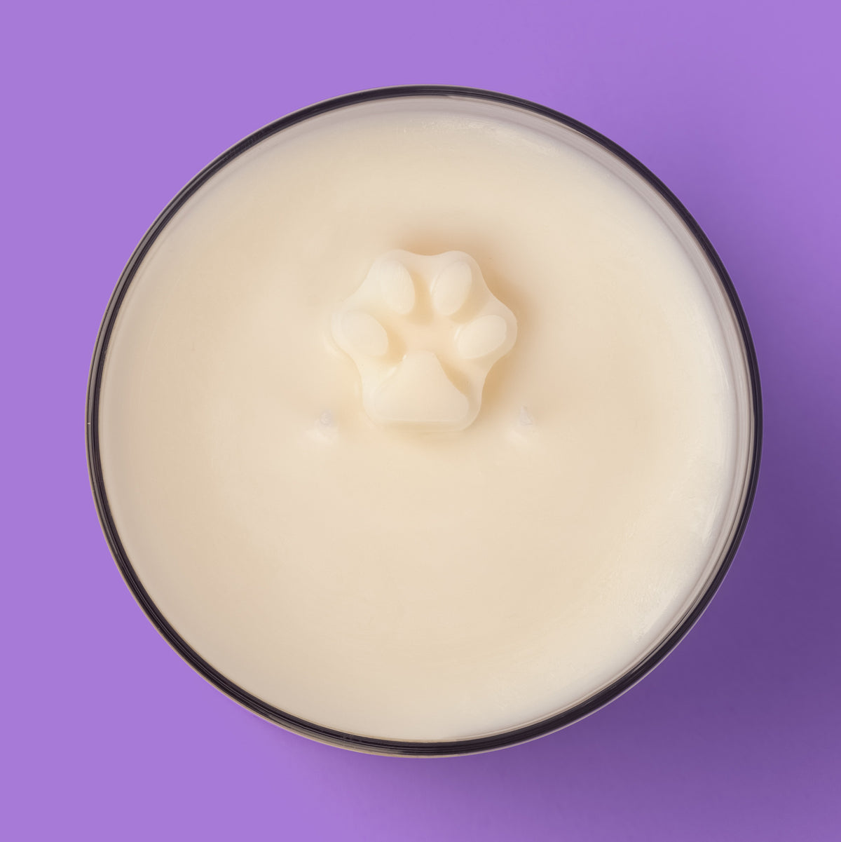 True Crime candle top view showing the paw wax embed